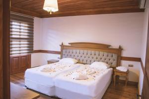 Postel nebo postele na pokoji v ubytování Thrace Konak Hotel & SPA