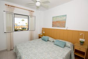 Postel nebo postele na pokoji v ubytování Apartamento con Vistas al mar