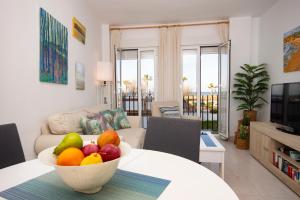 Posezení v ubytování Apartamento con Vistas al mar