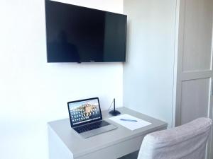 TV a/nebo společenská místnost v ubytování Vittoria Residence