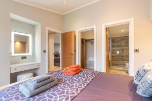 Postel nebo postele na pokoji v ubytování Sandpiper - Luxury Lodge, Close to Beach, Pet Friendly