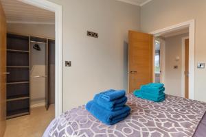 Postel nebo postele na pokoji v ubytování Sandpiper - Luxury Lodge, Close to Beach, Pet Friendly