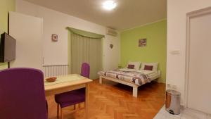 Postel nebo postele na pokoji v ubytování IstraNova Apartments