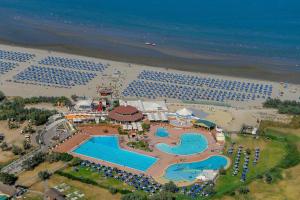 an aerial view of a resort with a beach at Fiordo Specchio Nautico in Isola Albarella