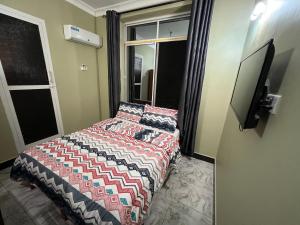Postel nebo postele na pokoji v ubytování PHYLLEN HOTEL
