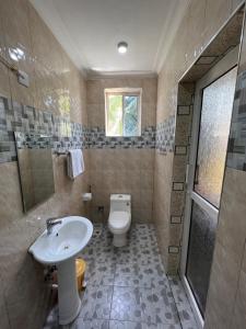 Koupelna v ubytování PHYLLEN HOTEL