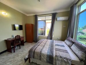 Postel nebo postele na pokoji v ubytování PHYLLEN HOTEL