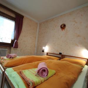 Voodi või voodid majutusasutuse Baita Stella Alpina toas