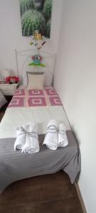 Postel nebo postele na pokoji v ubytování Casa Nieves de Mario