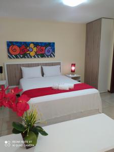 Postel nebo postele na pokoji v ubytování Solar Pipa Praia Flats