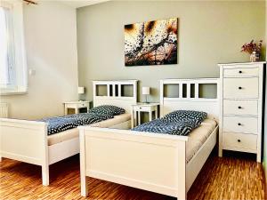 Postel nebo postele na pokoji v ubytování Apartmány Vojta