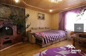 Postel nebo postele na pokoji v ubytování микуличин на долоні