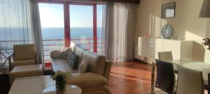 O zonă de relaxare la Apartamento na Praia