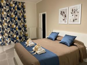A bed or beds in a room at B&B m’ama non m’ama