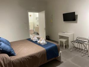 A bed or beds in a room at B&B m’ama non m’ama