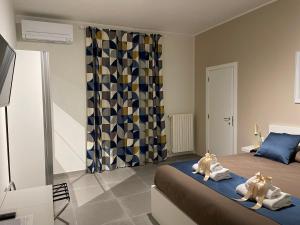 A bed or beds in a room at B&B m’ama non m’ama