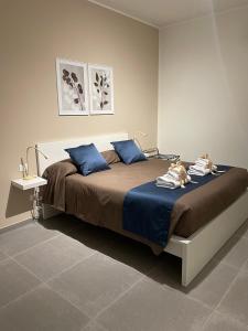 A bed or beds in a room at B&B m’ama non m’ama