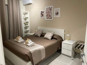 A bed or beds in a room at B&B m’ama non m’ama