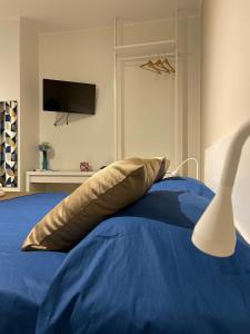 A bed or beds in a room at B&B m’ama non m’ama