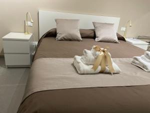 A bed or beds in a room at B&B m’ama non m’ama