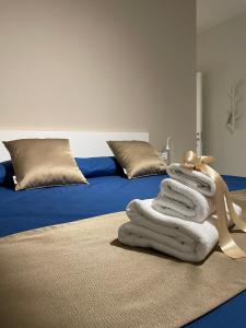 A bed or beds in a room at B&B m’ama non m’ama