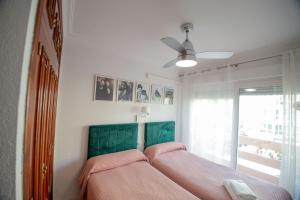 Кровать или кровати в номере "El Balcon de Huelva" lujo en pleno centro
