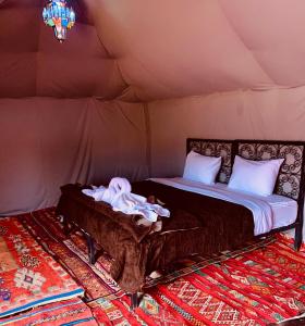 Posteľ alebo postele v izbe v ubytovaní Sahara wellness camp