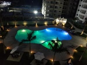 Výhled na bazén z ubytování Apartamento en Juan Dolio Tepuy 501 B nebo okolí