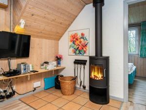A kitchen or kitchenette at 10 person holiday home in Oksb l