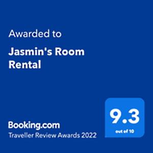 ein blaues Handy mit dem Text, der der Unterkunft Janslins Room verliehen wurde in der Unterkunft Jasmin's Room Rental, Room # 3 in Moalboal