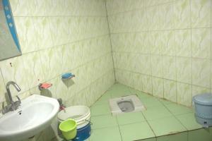 Ett badrum på BOJO House