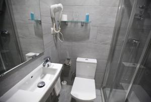 Ванная комната в Hotel Ciutat De Sant Adria