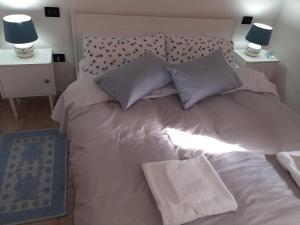 Tempat tidur dalam kamar di Casa Ester
