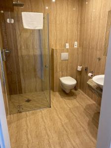 Koupelna v ubytování Hotel & Spa Biały Dom