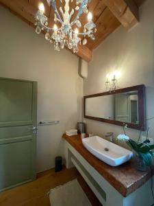 a bathroom with a sink and a mirror at BeB montefratta in Fratta Terme +66 photos
