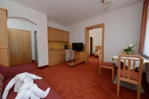 Sjónvarps- og/eða afþreyingartæki á Strandhotel Faak