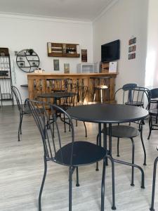 TV a/nebo společenská místnost v ubytování Aloha Hostel
