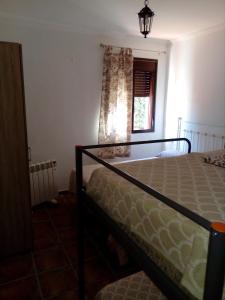 Posteľ alebo postele v izbe v ubytovaní CASA RURAL El Paso