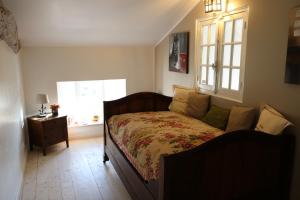 Gîte de charme dans ancienne seigneurie客房内的一张或多张床位