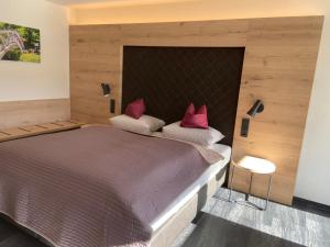 Postel nebo postele na pokoji v ubytování Hotel Koch