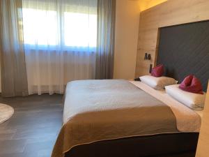 Postel nebo postele na pokoji v ubytování Hotel Koch