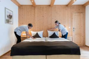 Postel nebo postele na pokoji v ubytování Hotel Bellevue