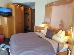 Postel nebo postele na pokoji v ubytování Hotel Koch