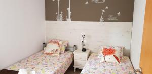 Posteľ alebo postele v izbe v ubytovaní Apartamento al canal