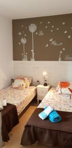 Posteľ alebo postele v izbe v ubytovaní Apartamento al canal
