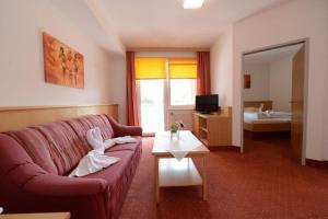 Sjónvarps- og/eða afþreyingartæki á Strandhotel Faak