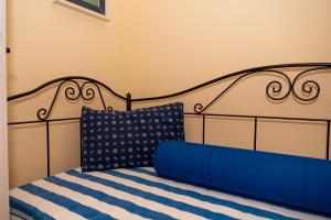Ένα ή περισσότερα κρεβάτια σε δωμάτιο στο Villa del Sole