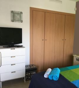 Posteľ alebo postele v izbe v ubytovaní Apartamento al canal