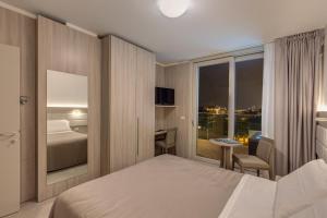 Postel nebo postele na pokoji v ubytování Sunrise Palace