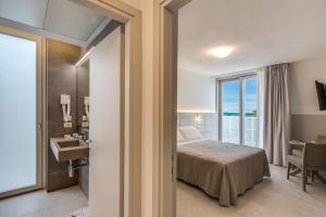 Postel nebo postele na pokoji v ubytování Sunrise Palace + 22 fotografií